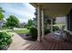 Inviting front porch with classic white rocking chairs, providing a serene outdoor space at 10865 Fairwoods Dr, Fishers, IN 46037