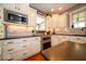 Well-appointed kitchen with stainless steel appliances and ample countertop space at 10865 Fairwoods Dr, Fishers, IN 46037