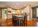 Spacious kitchen features a center island with granite countertops and seating at 10865 Fairwoods Dr, Fishers, IN 46037