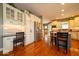 Bright kitchen features ample cabinet space, stainless appliances, and granite countertops at 10865 Fairwoods Dr, Fishers, IN 46037