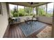 Enjoy this screened patio with ceiling fan and outside views for relaxation and entertaining at 10865 Fairwoods Dr, Fishers, IN 46037
