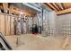 Basement utility area with exposed beams and concrete walls at 11266 Old Stone Dr, Indianapolis, IN 46236