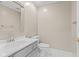 Neat bathroom with modern toilet, sink, mirror, and fixtures at 11266 Old Stone Dr, Indianapolis, IN 46236