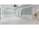 Spacious bedroom with tray ceiling, window seat and ceiling fan at 11266 Old Stone Dr, Indianapolis, IN 46236