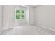 Neutral bedroom with ample natural light and closet, carpeted flooring, and fresh paint at 11266 Old Stone Dr, Indianapolis, IN 46236
