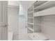 Organized walk-in closet with custom shelving and ample storage space at 11266 Old Stone Dr, Indianapolis, IN 46236