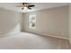 Bright bedroom with a ceiling fan, natural light, and neutral colors at 11763 Igneous Dr, Fishers, IN 46038