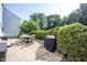 Beautiful backyard features patio with dining set and a built in BBQ at 13829 Black Canyon Ct, Fishers, IN 46038