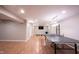 The finished basement features a ping pong table and enough space to play with friends at 13829 Black Canyon Ct, Fishers, IN 46038