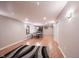 Spacious finished basement provides recreation with the ping pong table and basketball hoop at 13829 Black Canyon Ct, Fishers, IN 46038