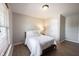 This room is bright and comfortable with light walls, wood floor and large windows at 13829 Black Canyon Ct, Fishers, IN 46038