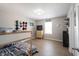 This room is well lit and includes a bunk bed and wood floors at 13829 Black Canyon Ct, Fishers, IN 46038
