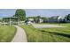 Community park with a gazebo, basketball court, and walking path at 13829 Black Canyon Ct, Fishers, IN 46038