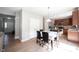 Kitchen/eating area featuring wood cabinets, stainless steel appliances, open concept design at 13829 Black Canyon Ct, Fishers, IN 46038