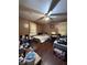 This bedroom boasts two beds, a ceiling fan, and a window for lots of natural light at 1425 Sharon Ave, Indianapolis, IN 46222