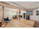 Basement entertainment space featuring a bar, gaming area, and modern finishes, offering a perfect blend of relaxation and fun at 14729 Erica Ln, Carmel, IN 46033
