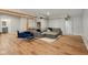Open basement with modern design featuring a lounge area, bar, wooden beams, and ample space for relaxation and entertainment at 14729 Erica Ln, Carmel, IN 46033