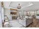 Open concept living room features a fireplace and comfortable seating at 14729 Erica Ln, Carmel, IN 46033