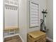Functional mudroom featuring built-in storage, a bench, and convenient organization options for a tidy entryway at 14729 Erica Ln, Carmel, IN 46033