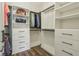 Spacious walk-in closet features multiple clothing rods, drawers, and organizers at 14729 Erica Ln, Carmel, IN 46033