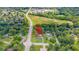 Aerial view of the property highlighting its location near schools, parks, and recreational areas at 1605 Westlane Rd, Indianapolis, IN 46260