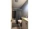 Bathroom featuring tiled shower and vanity, ready for upgrades at 1728 N Somerset Ave, Indianapolis, IN 46222