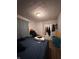 Modest bedroom with a patterned ceiling, curtains, and space for a full-sized bed at 1728 N Somerset Ave, Indianapolis, IN 46222