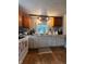 Functional kitchen with white cabinets, wood countertops, and modern appliances at 1728 N Somerset Ave, Indianapolis, IN 46222