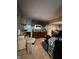 Functional kitchen with white appliances and tile flooring, ready for updates and personalization at 1728 N Somerset Ave, Indianapolis, IN 46222