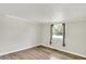 Bedroom with a window, tile flooring, and neutral walls at 1759 Michele Ln, Greenwood, IN 46142