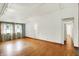 Spacious living room with hardwood floors, neutral paint, vaulted ceilings, and bright natural light at 1759 Michele Ln, Greenwood, IN 46142