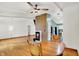 Open-concept layout with a fireplace and dining area, blending seamlessly into the adjacent kitchen at 1759 Michele Ln, Greenwood, IN 46142