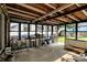 Bright sun room with ample natural light from large windows and access to the outdoors at 1759 Michele Ln, Greenwood, IN 46142