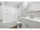 Well-lit bathroom featuring a shower-tub combination and a modern sink at 1933 Tallman Ave, Indianapolis, IN 46218