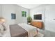 Stylish bedroom with natural light and minimalist design featuring a TV at 1933 Tallman Ave, Indianapolis, IN 46218