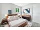 Modern bedroom with sleek furniture, television and a cozy contemporary aesthetic at 1933 Tallman Ave, Indianapolis, IN 46218
