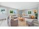 Warm and inviting living room with comfortable seating, natural light, and a welcoming atmosphere at 1933 Tallman Ave, Indianapolis, IN 46218