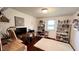 Cozy bedroom features hardwood floors, natural light, and built-in shelving, creating a warm and inviting space at 202 Collier St, Columbus, IN 47201