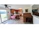 Cozy eat-in kitchen with warm wood cabinets, laminate countertops, and vintage charm at 202 Collier St, Columbus, IN 47201