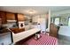 Spacious eat-in kitchen with vintage touches, white appliances, and ample cabinetry at 202 Collier St, Columbus, IN 47201