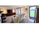 Bright living room featuring neutral tones, plush seating, and ample natural light, creating a cozy atmosphere for relaxation at 202 Collier St, Columbus, IN 47201