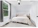 Cozy bedroom featuring a comfortable bed, soft lighting, and a serene atmosphere for relaxation at 3035 Guilford Ave, Indianapolis, IN 46205