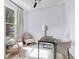 Bright home office features an abundance of natural light and calming neutral decor at 3035 Guilford Ave, Indianapolis, IN 46205