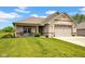 Attractive brick home featuring a cozy front porch with seating and a lush green lawn at 3072 W Glacier Dr, Monrovia, IN 46157