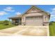 Beautiful brick home with a well-maintained lawn and a spacious two-car attached garage at 3072 W Glacier Dr, Monrovia, IN 46157