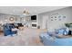 Bright and airy living room featuring comfortable seating, a fireplace, and stylish décor at 3072 W Glacier Dr, Monrovia, IN 46157