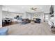 Open-concept living space with a modern kitchen, dining area, and comfortable seating arrangement at 3072 W Glacier Dr, Monrovia, IN 46157
