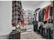 Spacious walk-in closet with built-in shelves and hanging rods, offering ample storage space at 3072 W Glacier Dr, Monrovia, IN 46157