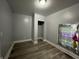 This bedroom offers wood floors and a small closet at 3127 E Lynn St, Anderson, IN 46016
