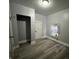 This bedroom has wood floors, gray walls and a walk-in closet at 3127 E Lynn St, Anderson, IN 46016